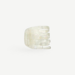 KABE SHOP INC mini claw hair clip in pearlescent white Italian bio-acetate with a smooth, polished finish.