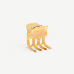 KABE SHOP INC mini claw hair clip in a translucent cream and beige marbled Italian bio-acetate finish