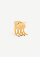 KABE SHOP INC mini claw hair clip in a translucent cream and beige marbled Italian bio-acetate finish
