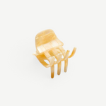 KABE SHOP INC handcrafted mini claw hair clip in a translucent beige marbled Italian bio-acetate finish.
