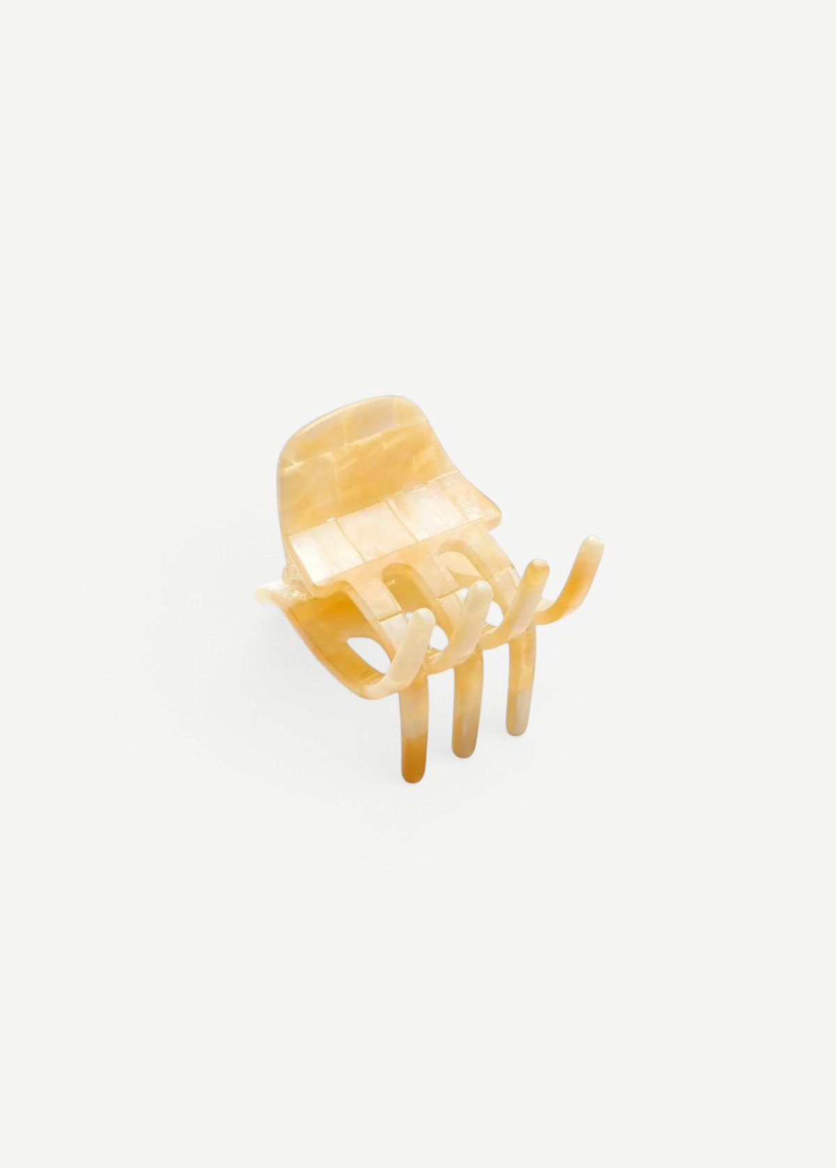 KABE SHOP INC handcrafted mini claw hair clip in a translucent beige marbled Italian bio-acetate finish.