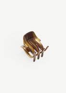 KABE SHOP INC handcrafted mini claw hair clip in a brown striped Italian bio-acetate finish for all hair types.