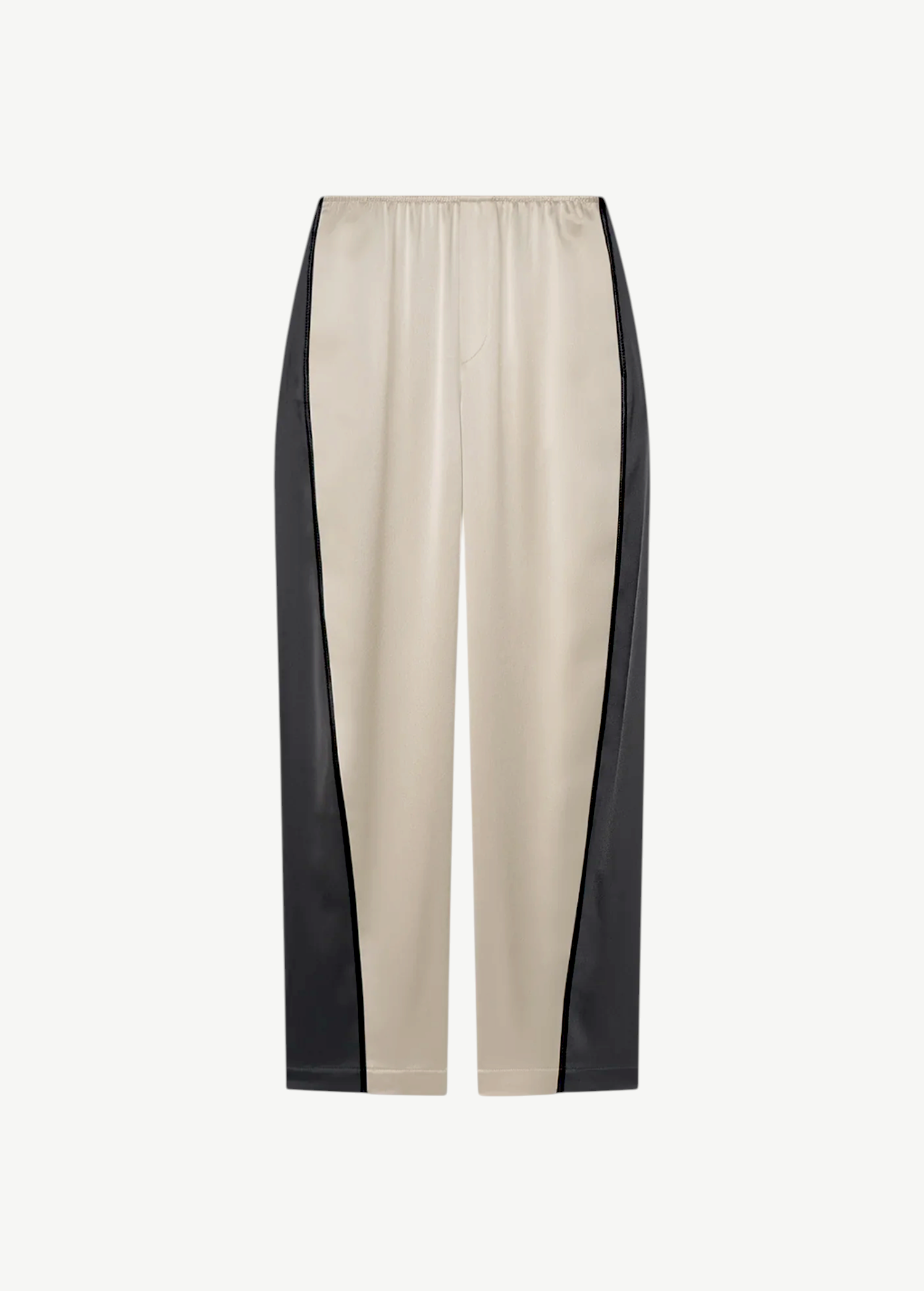 Beige Zoela Pants featuring black side panels, an elastic waistband, and a relaxed, wide barrel-leg silhouette, showcased against a plain white background.