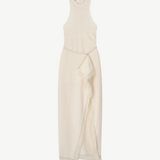 The Rayen Dress is a sleeveless, cream-colored cotton-linen dress with a high neckline and a wrap-style skirt accented by fringed hem details, shown flat against a white background.