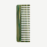 A green and tan marbled Italian acetate No. 2 Comb with wide teeth.