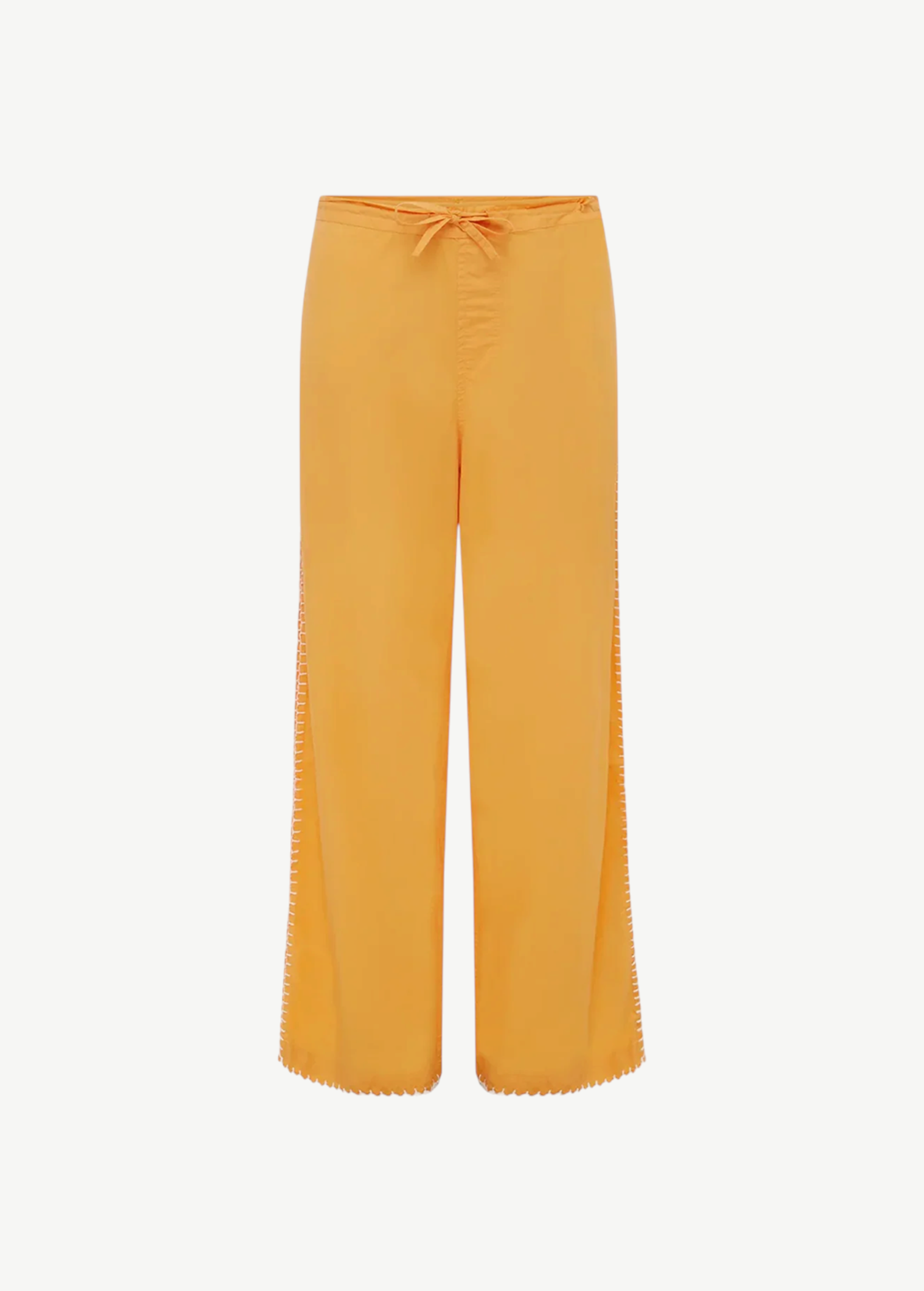 KABE SHOP INC Casa Pant in vibrant orange organic cotton with a relaxed wide-leg fit and white crochet side detail.