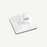 KABE SHOP INC Oh Mon Dieu! white porcelain incense holder featuring a sculptural pair of lips in a 1960s style.
