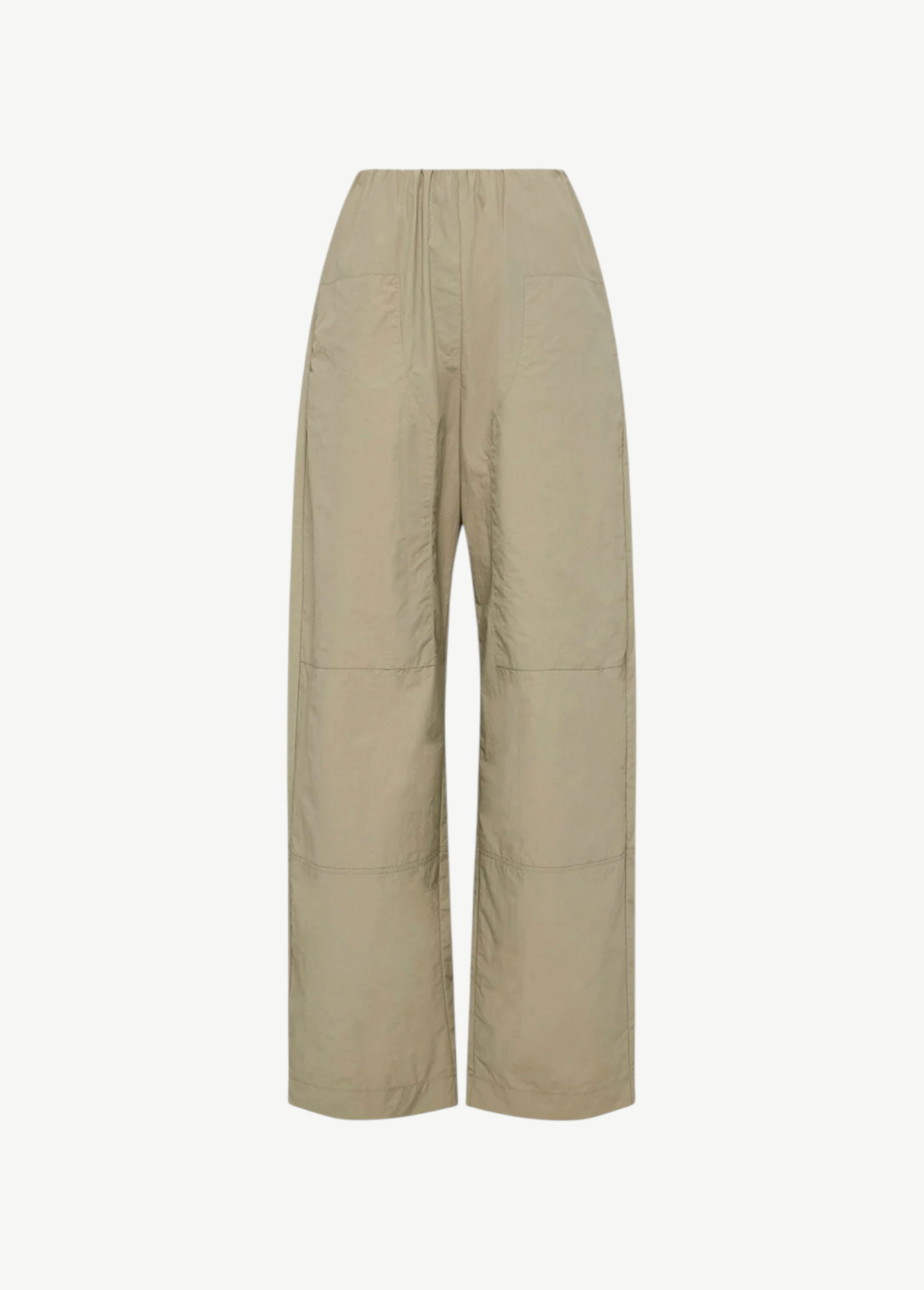 Beige Cocoon Trackpant with an elastic high-waisted fit, horizontal seam detailing, and a relaxed trouser silhouette.