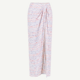 The Sarong Skirt is a long, high-waisted piece with a pastel multicolor speckled pattern. It features a straight silhouette, ankle-length hem, and is accented by a side drape and gathered waist detail—perfect for effortless beachwear.