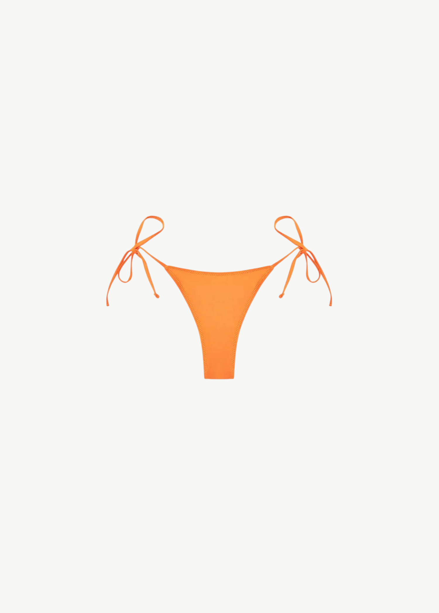 The Praia Bottom, a bright orange triangle bikini bottom with adjustable side ties, crafted from our eco-friendly Peach Perfect fabric, is displayed on a plain white background.