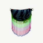 KABE SHOP INC Nayade bag featuring blue patterned fabric with long, vibrant green, pink, and blue beaded fringe.