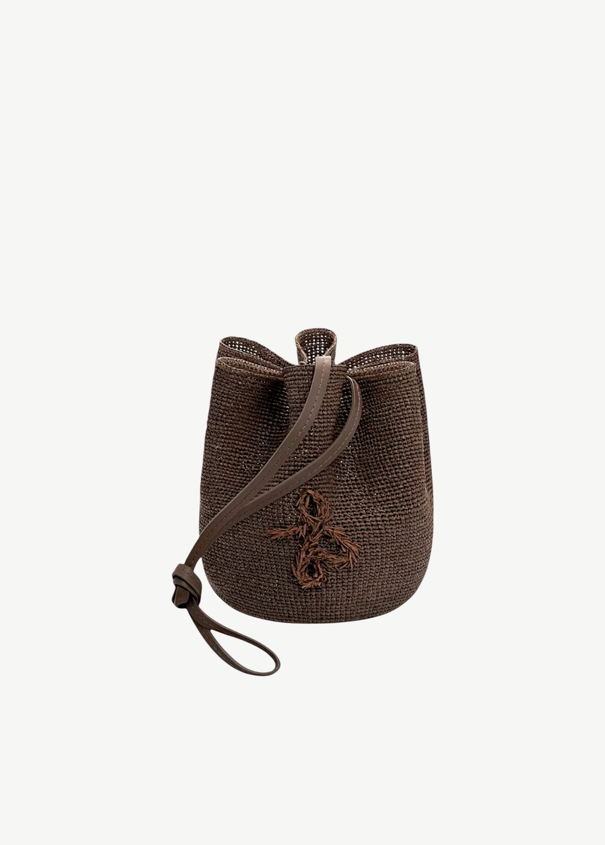 KABE SHOP INC brown woven bucket bag with a drawstring closure and embroidered logo detail on the front.