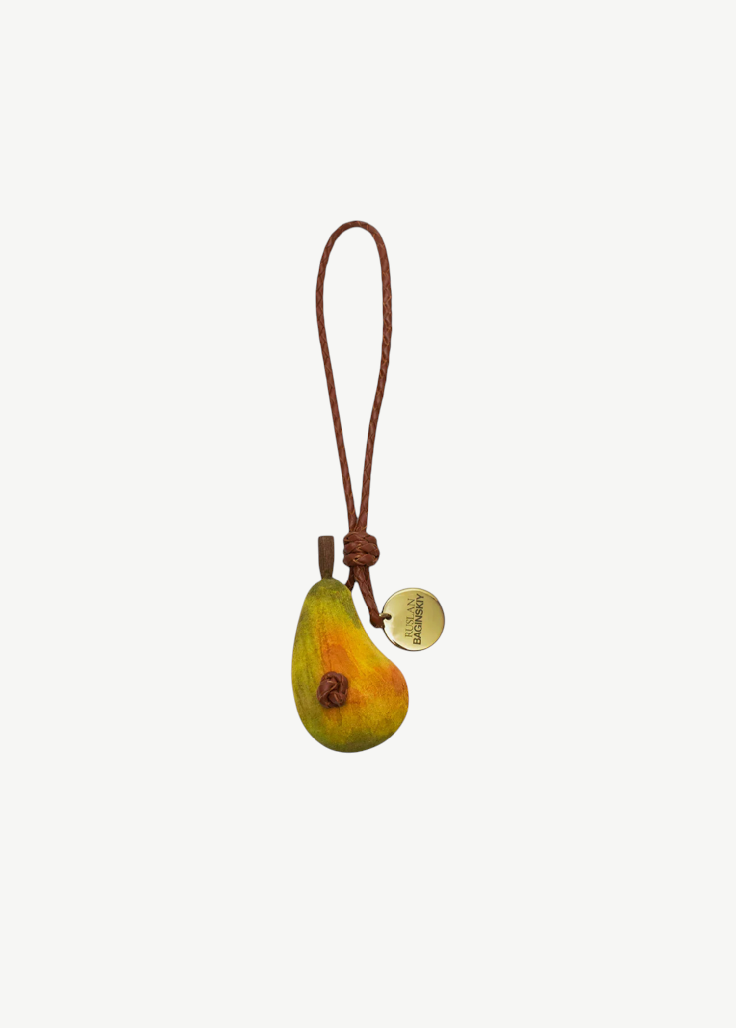 KABE SHOP INC pear-shaped wooden bag charm with a braided leather strap and a gold-tone branded metal tag.