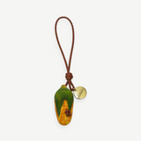 KABE SHOP INC corn-shaped wooden bag charm with a braided brown leather strap and a small gold-tone metal tag.