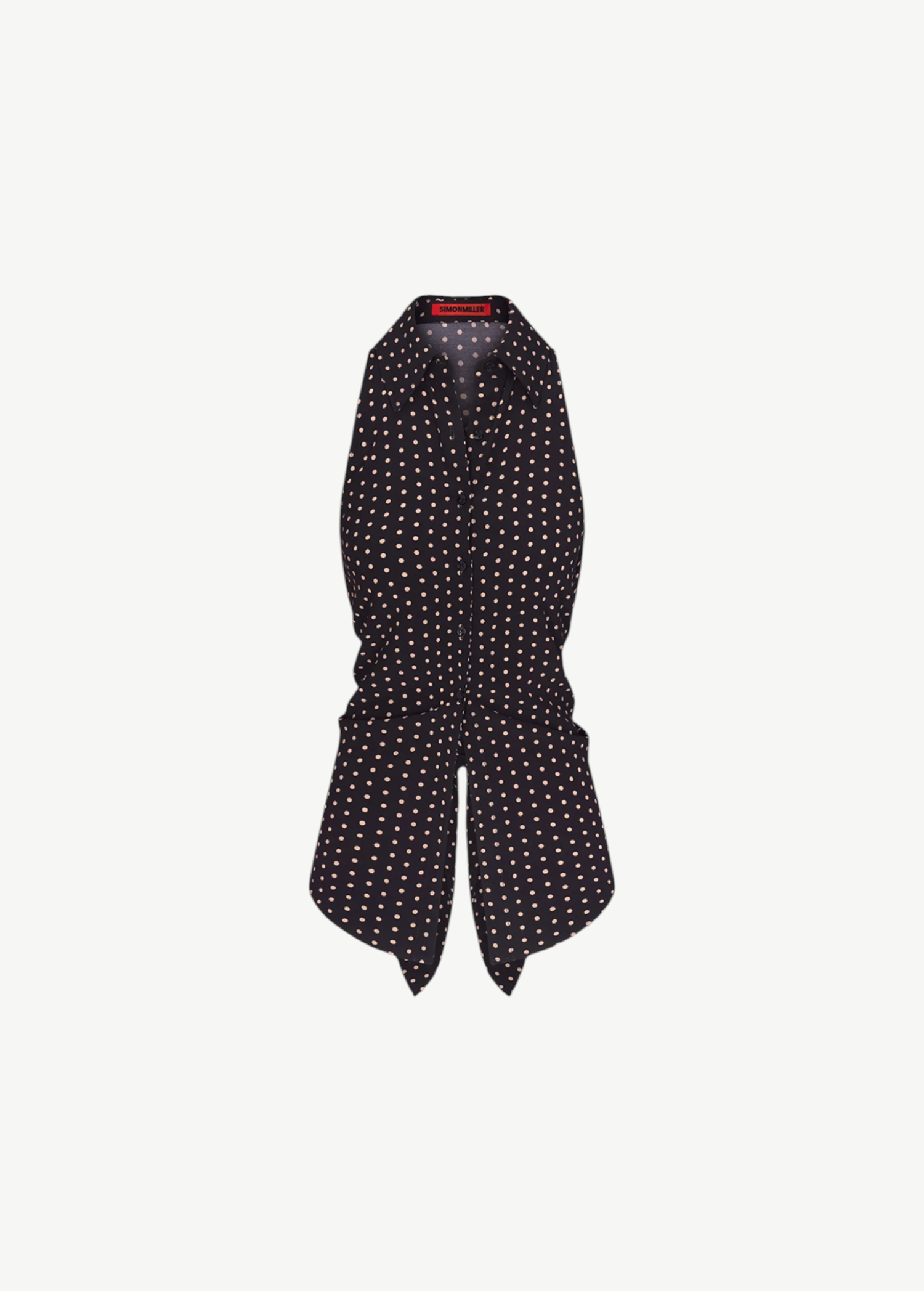 Loch Sleeveless Crepe Button Up in black with a light-colored polka dot pattern, front tie detail, and an elegant, modern feel.