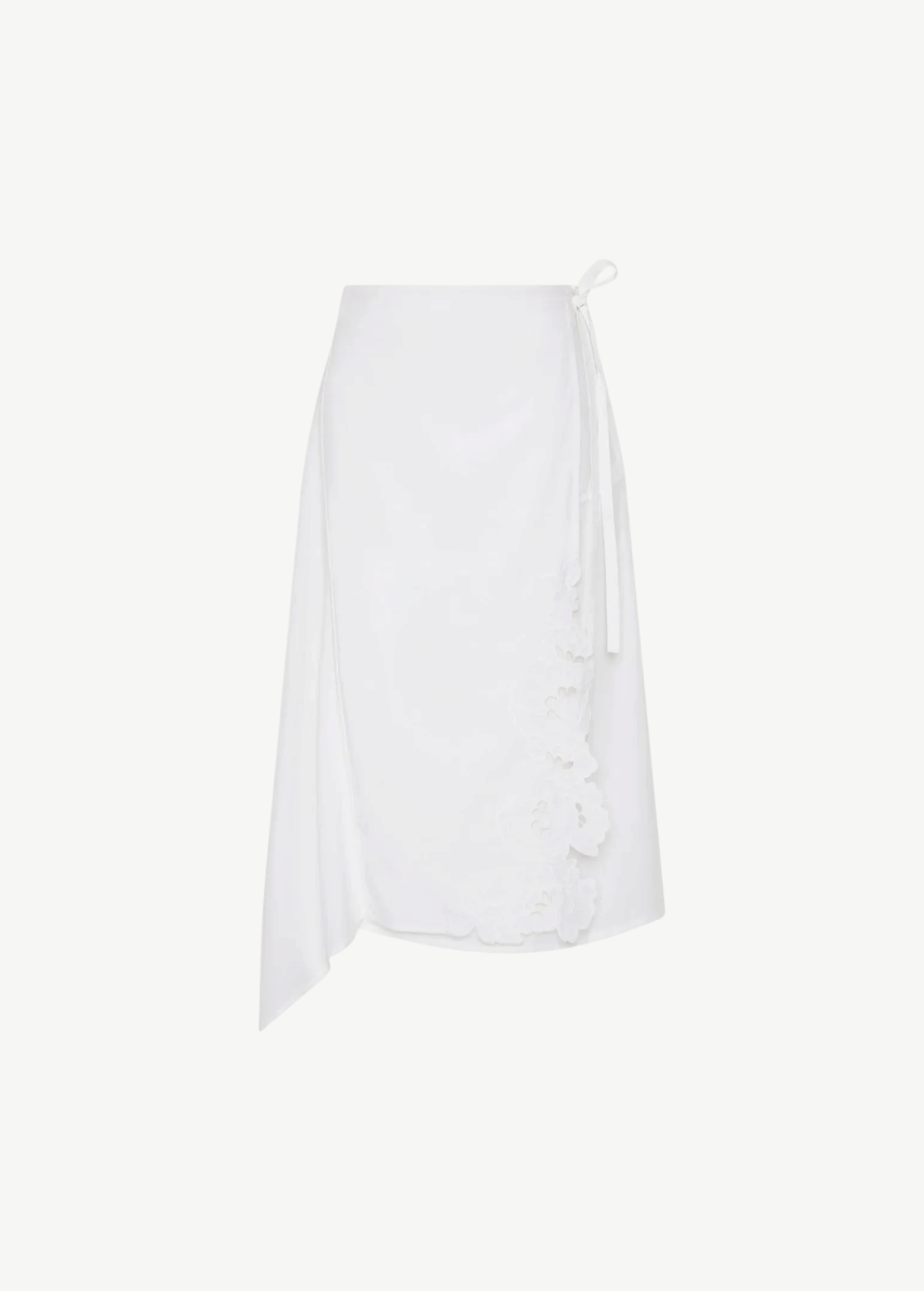 KABE SHOP INC Klara midi skirt in white cotton with floral cut-out embroidery and an asymmetric wrap silhouette.