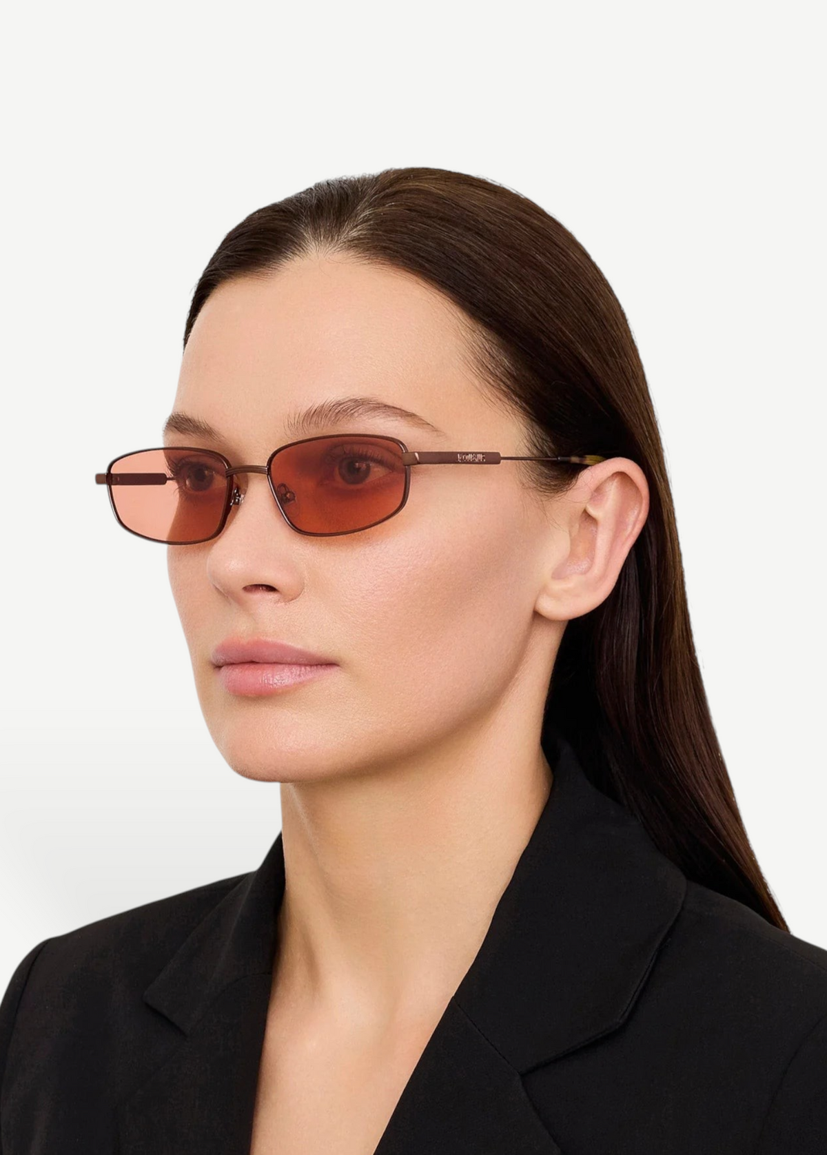 KABE SHOP INC Sera rectangular sunglasses with matte brown stainless steel frames and rose-tinted lenses on a model