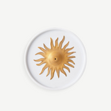 KABE SHOP INC Soleil porcelain incense holder with a gold hand-painted sun motif on a white circular base.