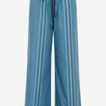 Mateo Pant wide-leg trousers in blue and teal vertical stripes, featuring a relaxed fit and a black elasticized drawstring waist.