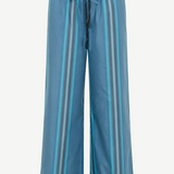 Mateo Pant wide-leg trousers in blue and teal vertical stripes, featuring a relaxed fit and a black elasticized drawstring waist.