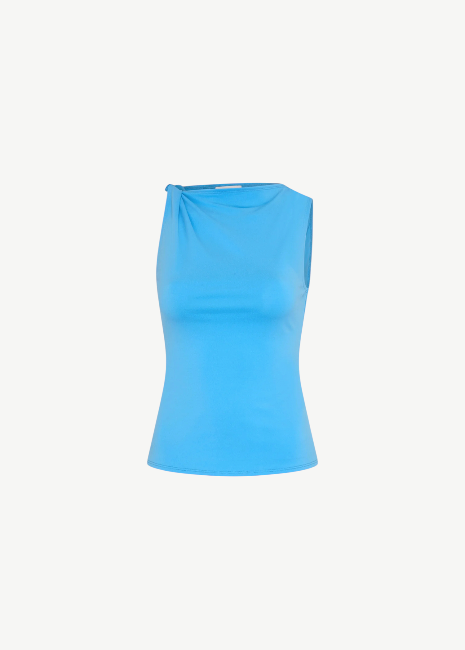 Elemental Twist Singlet in bright blue, featuring a sleeveless design with a sculptural shoulder and a contemporary draped, twisted detail.