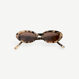 Sylvie sunglasses in a tortoiseshell oval frame with brown UV400 lenses, displayed on a plain white background.