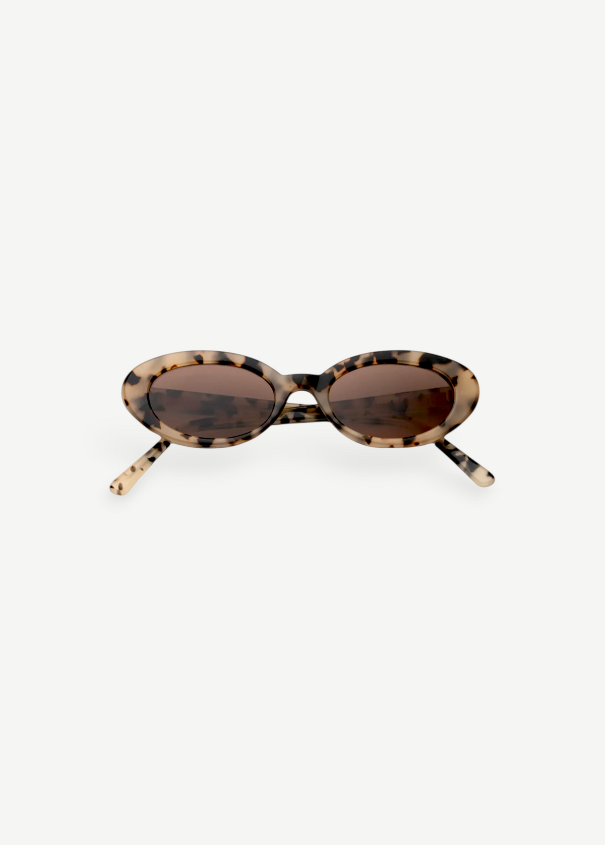 Sylvie sunglasses in a tortoiseshell oval frame with brown UV400 lenses, displayed on a plain white background.