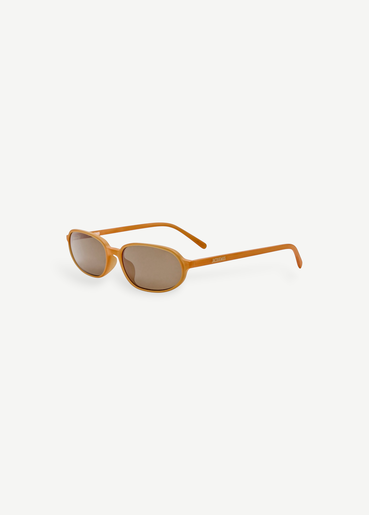 KABE SHOP INC Jacquemus Notte sunglasses in caramel acetate with an angular oval frame and brown lenses.