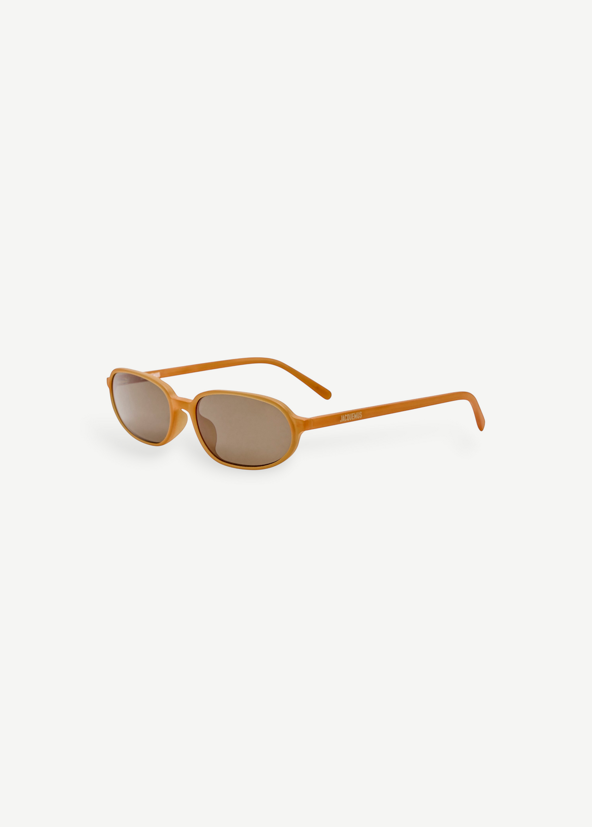 KABE SHOP INC Jacquemus Notte sunglasses in caramel acetate with an angular oval frame and brown lenses.