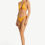 Model wearing a KABE SHOP INC Sofie Tri yellow textured triangle bikini set with adjustable ties