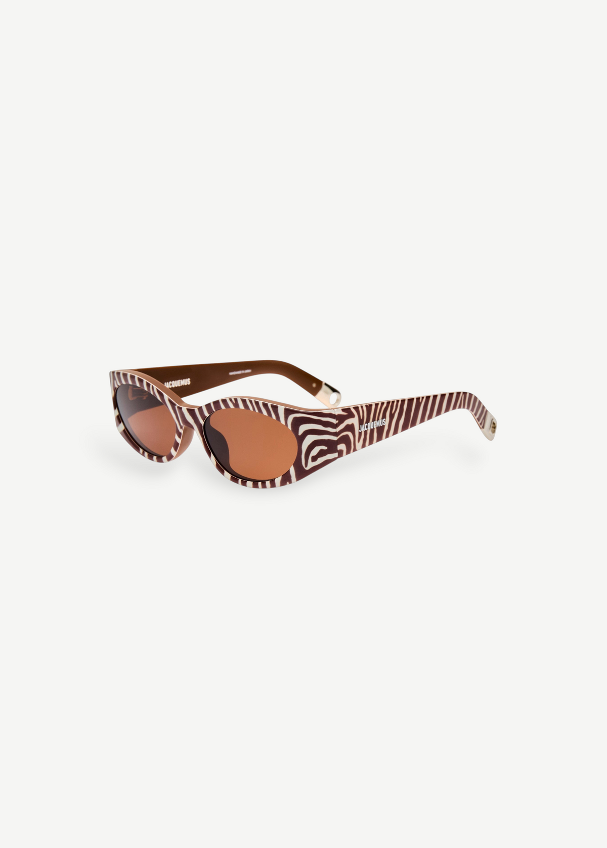 KABE SHOP INC Jacquemus Ovalo sunglasses featuring a brown and white zebra print frame with brown lenses