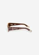 KABE SHOP INC Jacquemus Ovalo sunglasses featuring a brown and white zebra print frame with side logo branding