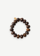 KABE SHOP INC Bronzite Bracelet featuring faceted brown natural stones and an 18K gold-plated sterling silver charm.