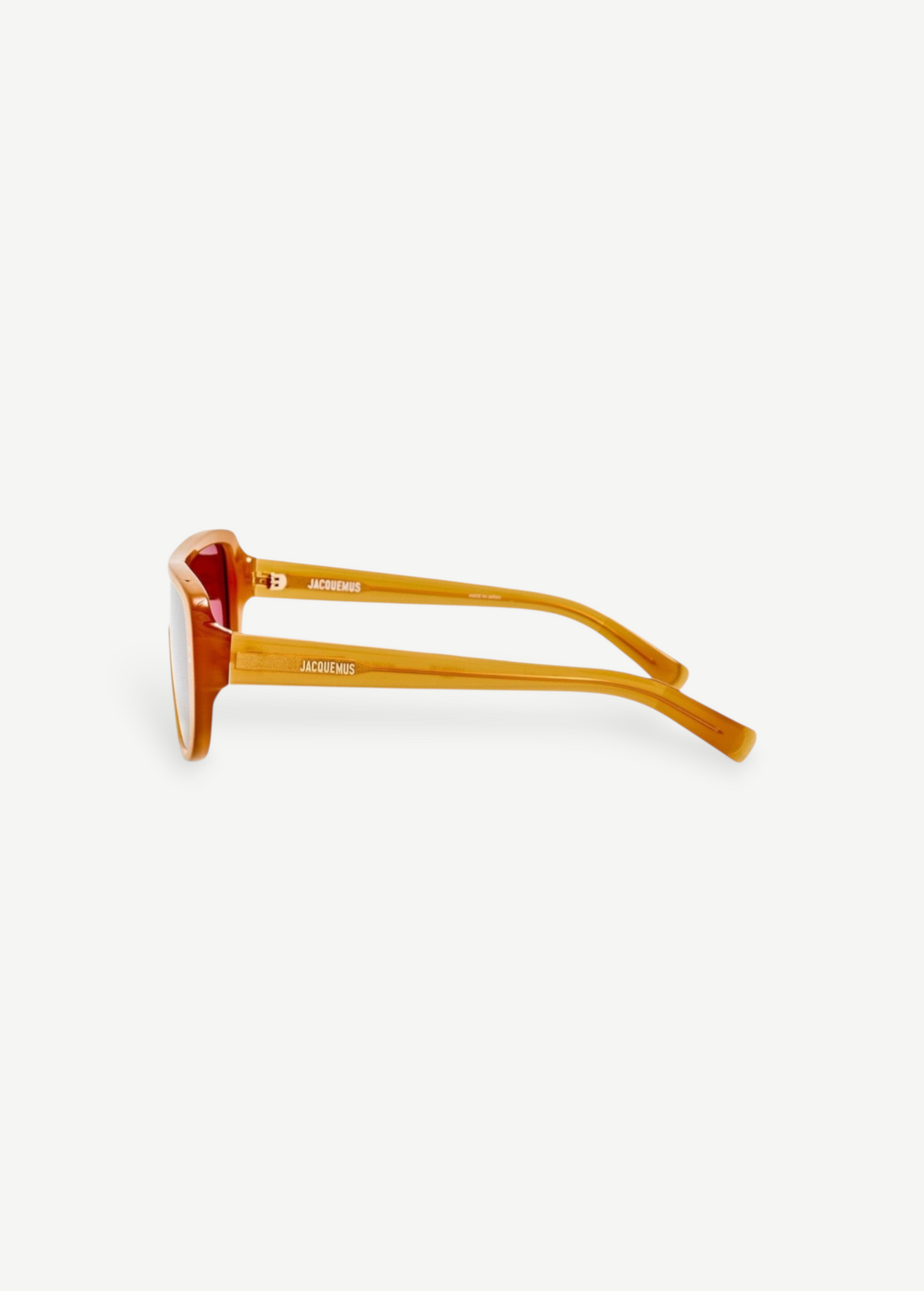 KABE SHOP INC Jacquemus Masco shield sunglasses in caramel acetate with brown lenses, side profile view.