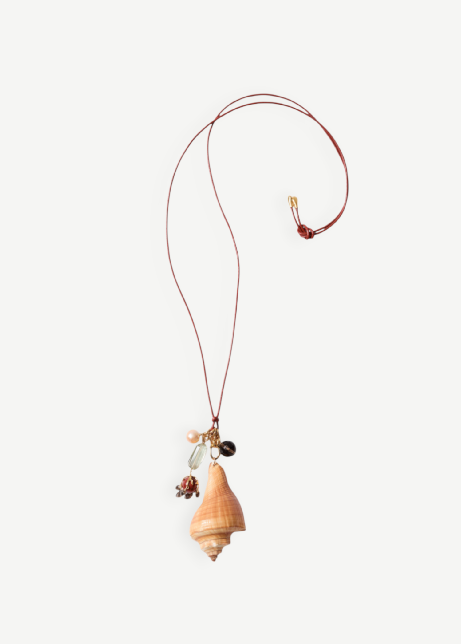 KABE SHOP INC Shell Necklace featuring a large seashell, colorful stone beads, and pearls on adjustable leather cord
