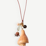 KABE SHOP INC shell necklace featuring a natural conch shell, colorful stone charms, and adjustable leather cord.