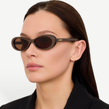 KABE SHOP INC Jacquemus Nuvola sunglasses with metallic brown oval acetate frames and brown lenses on a model