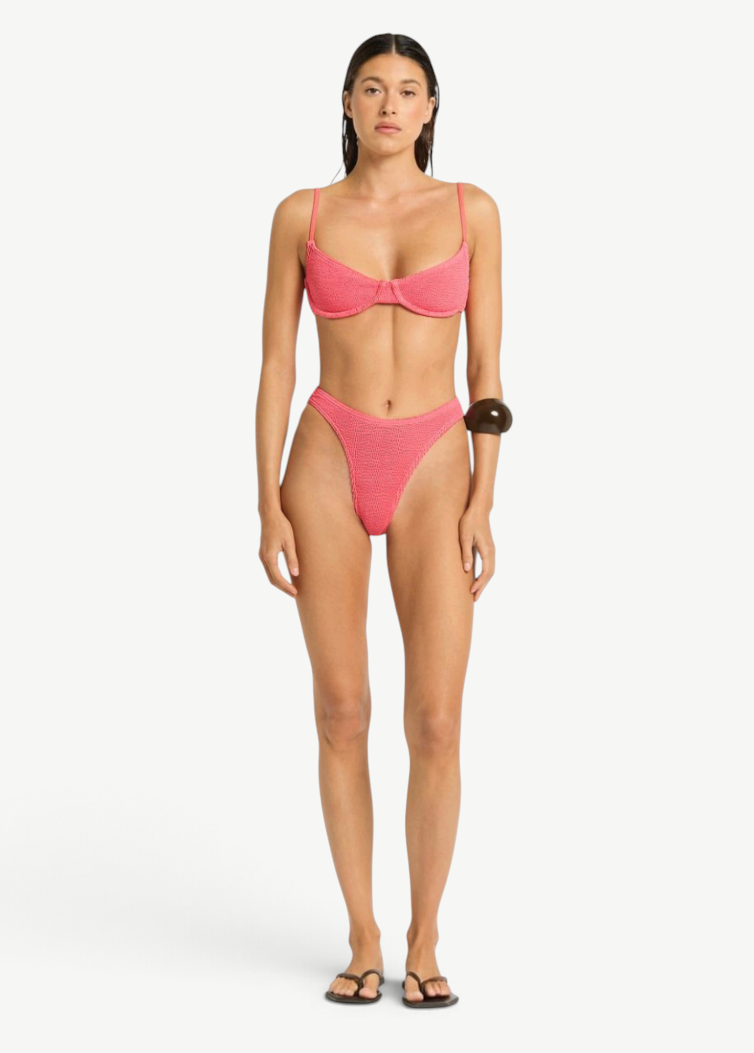 Model wearing KABE SHOP INC Gracie Balconette pink textured bikini set with high-cut bottoms and supportive top