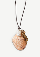KABE SHOP INC butterfly shell necklace with whiskey quartz, baroque pearl, and adjustable brown leather cord.