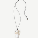 KABE SHOP INC conch shell and freshwater baroque pearl statement necklace on black satin cord with adjustable length