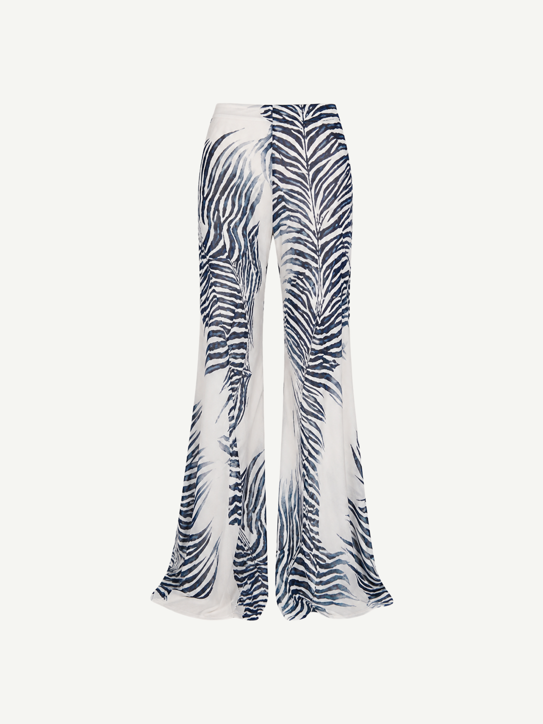 High-waisted, wide-leg Luma Trouser in white with a dark blue palm leaf print, crafted from lightweight viscose georgette.