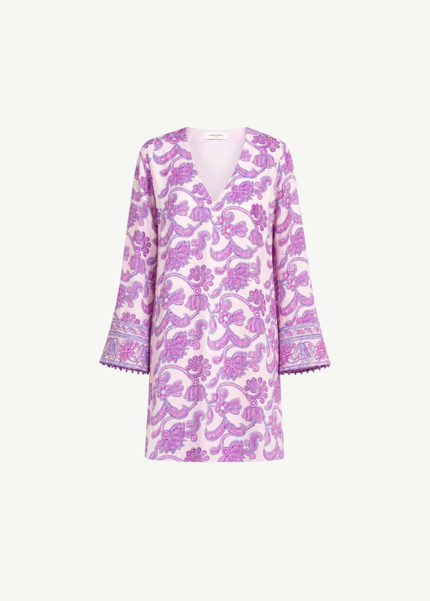 KABE SHOP INC Jaya tunic dress in light pink with purple paisley print, V-neck, and pom-pom trim on sleeves.
