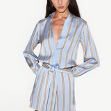 KABE SHOP INC Formentera romper in light blue with vertical brown stripes, collared neckline, and self-tie waist.