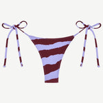 Introducing the Praia Bottom: a bikini bottom with maroon and light purple diagonal stripes, featuring adjustable side ties with bows on both hips, crafted from our eco-friendly Peach Perfect swimwear fabric.